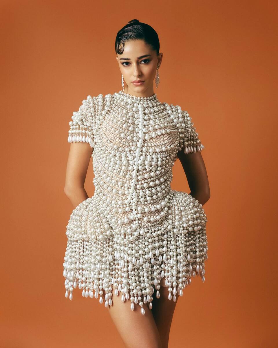 Ananya loves to experiment and this dazzling look of her in a mini white pearl dress proves it. The sculpted dress was nothing short of an architectural marvel.